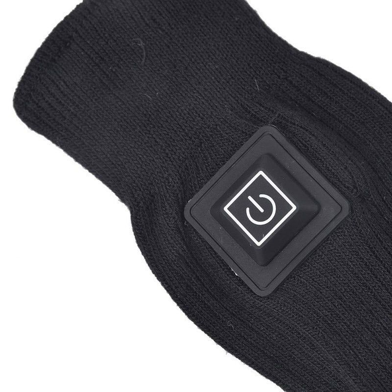 Beheizbare Socken Detail – Ein-/Aus-Taste auf dem gerippten Strickschaft