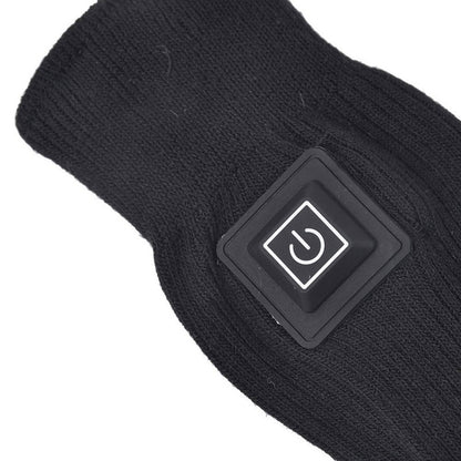 Beheizbare Socken Detail – Ein-/Aus-Taste auf dem gerippten Strickschaft