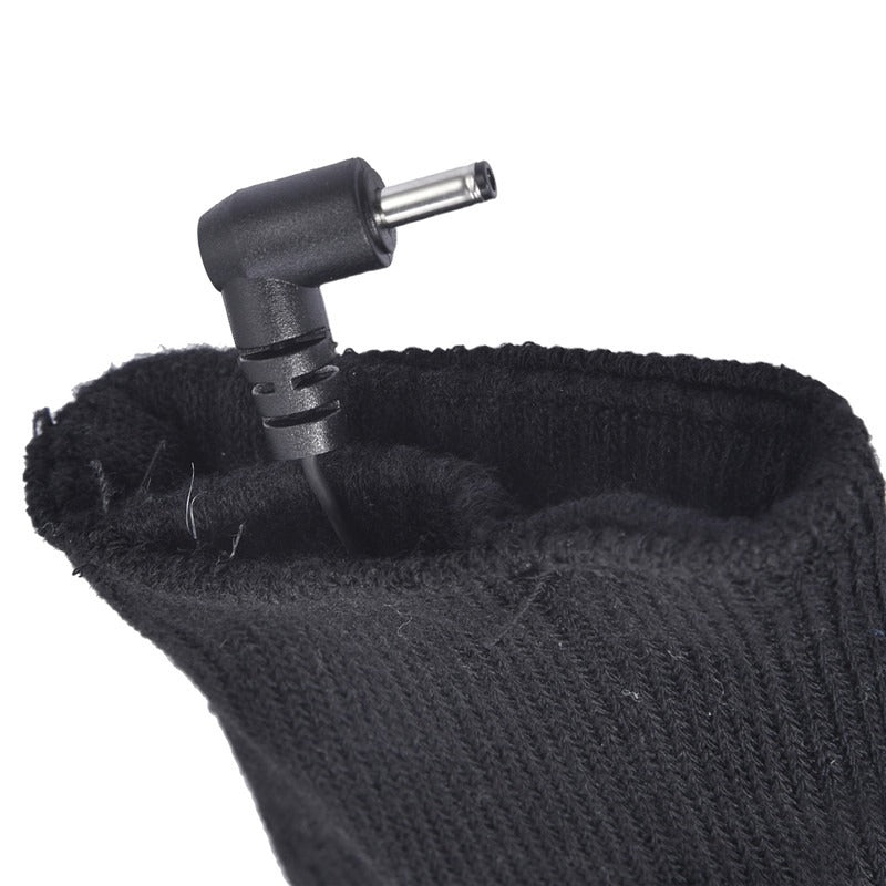 Beheizbare Socken Detail – Anschlussstecker am Bündchen für den Akkupack