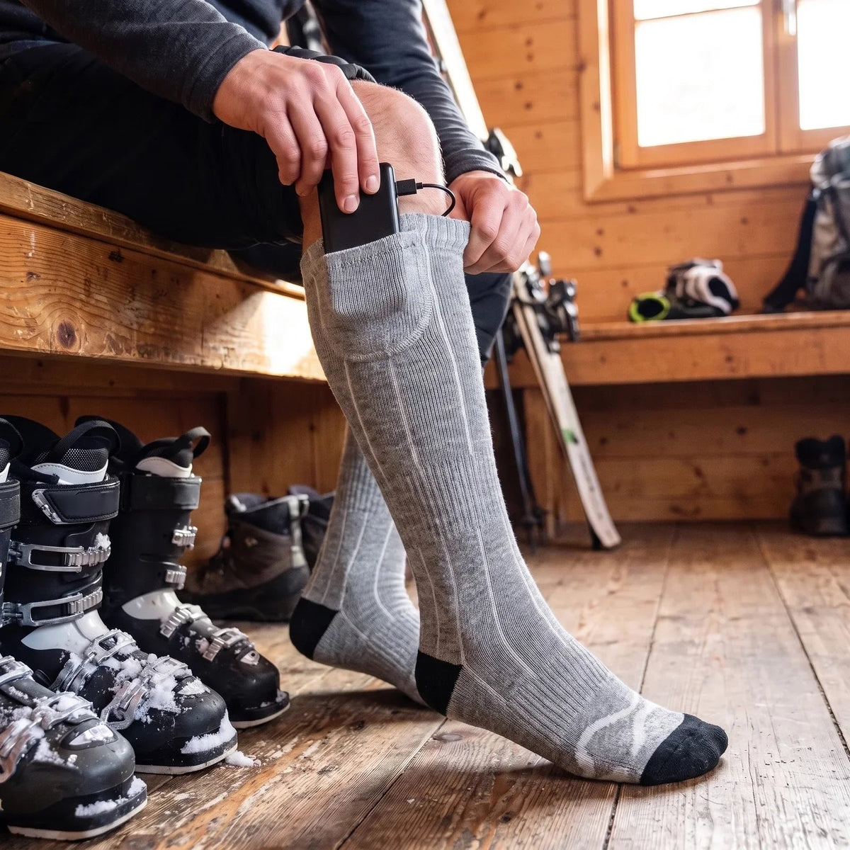 Beheizbare Socken – Akkutasche am Bund