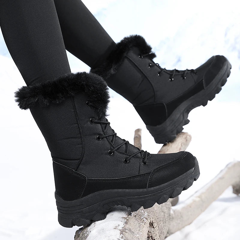 Winterstiefel Damen getragen beim Steigen über einen Baumstamm