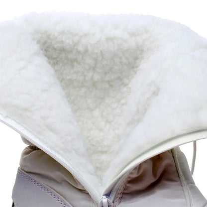 Winterstiefel Damen gefüttert – Nahaufnahme des weißen Plüschfutters