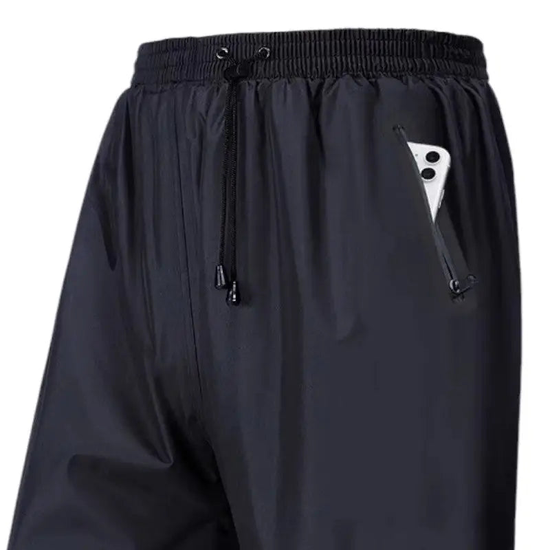 Regenhose Herren - wasserdicht & atmungsaktiv - mit Reißverschlusstaschen