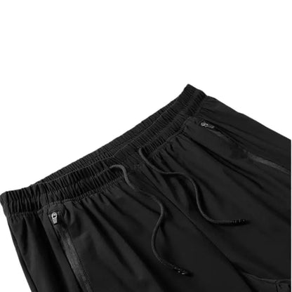 Regenhose Herren - wasserdicht & atmungsaktiv - mit Reißverschlusstaschen