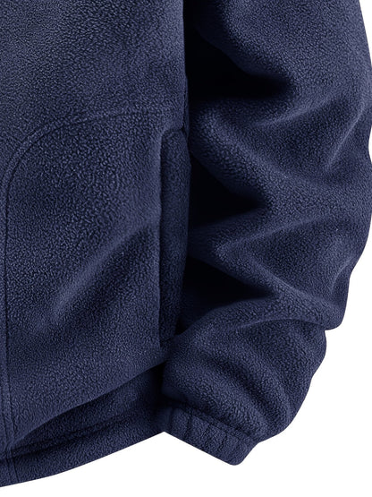 Nahaufnahme von Fleece und elastischem Ärmelbündchen in Marineblau
