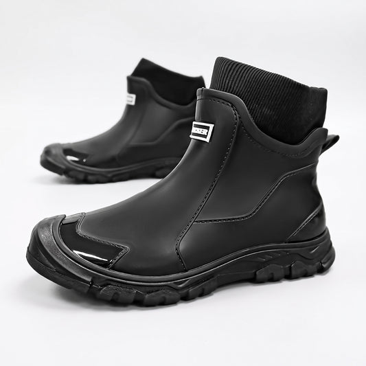 Gummistiefel gefüttert Damen & Herren, Farbe Schwarz – Paar auf weißem Hintergrund