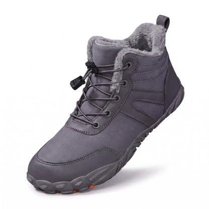 Winterschuhe Damen in Grau mit Schnellschnürung und Profilsohle auf weißem Hintergrund